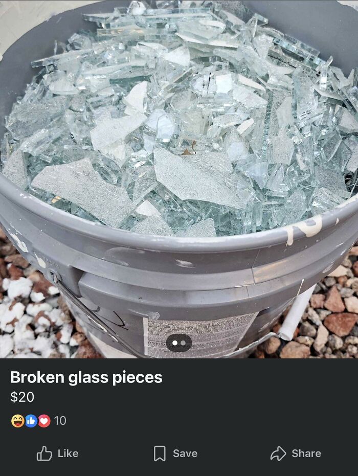 A grey bucket filled with jagged broken glass, advertised for $20. An example of people selling trash.