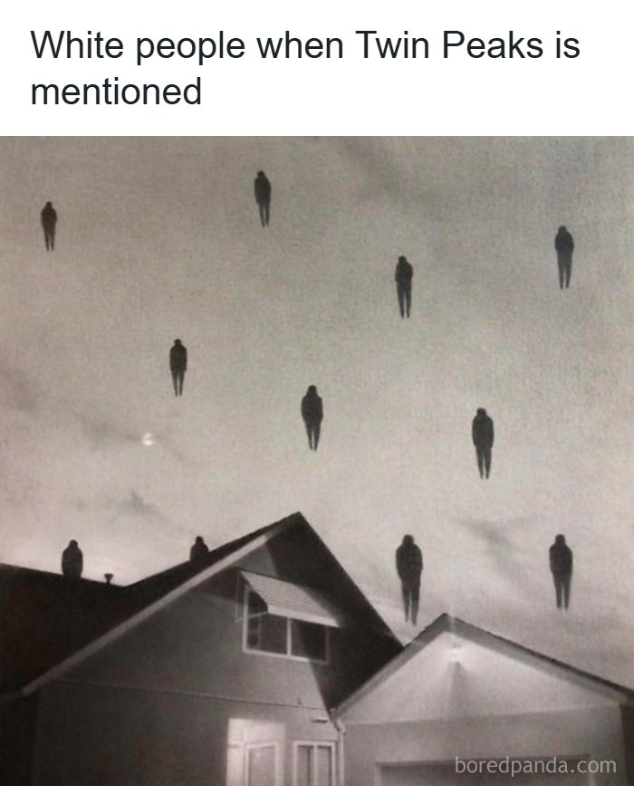 Surreal image of shadowy humanoid figures floating above houses, illustrating confusing and unhinged visual effects.