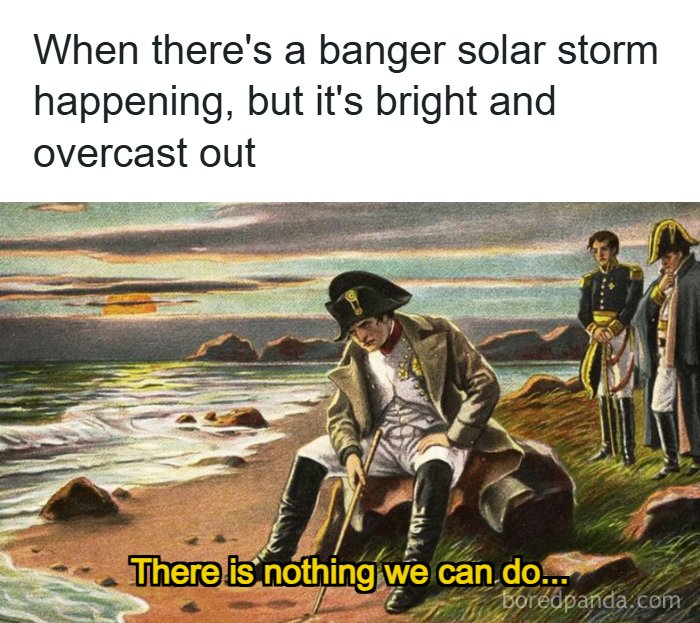 A humorous meme about living in Alaska, featuring Napoleon looking dejected on a beach.
