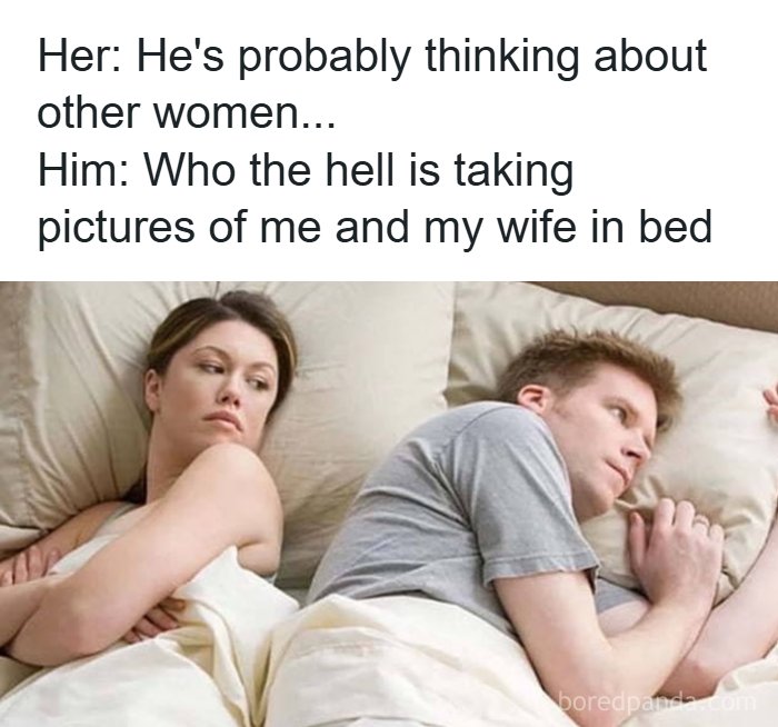 Couple lying in bed with the woman looking suspicious while the man appears confused, reflecting romantic relationships memes.