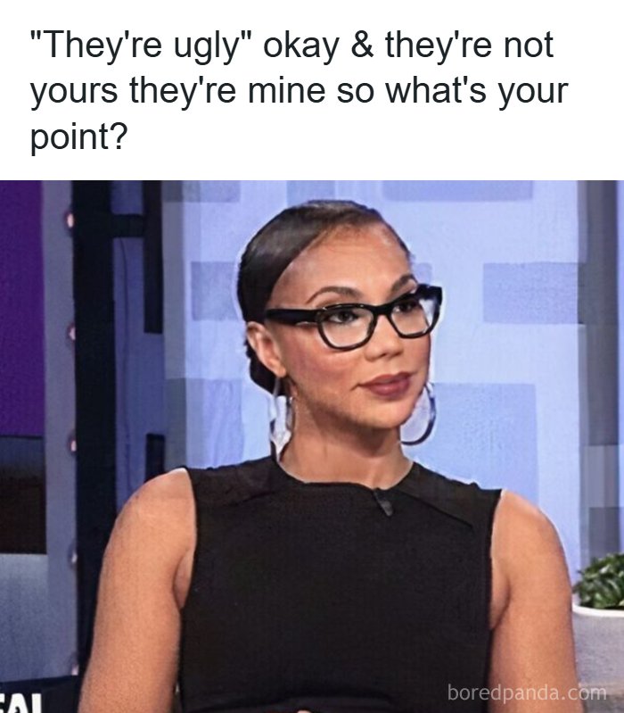 Woman with glasses and hoop earrings in black top expressing a funny romantic relationships meme about ownership and appearance.