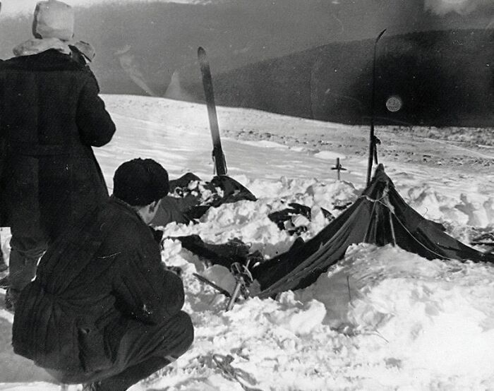 Two people near a snow-covered tent in a barren landscape illustrating horrifying historical facts rarely known.