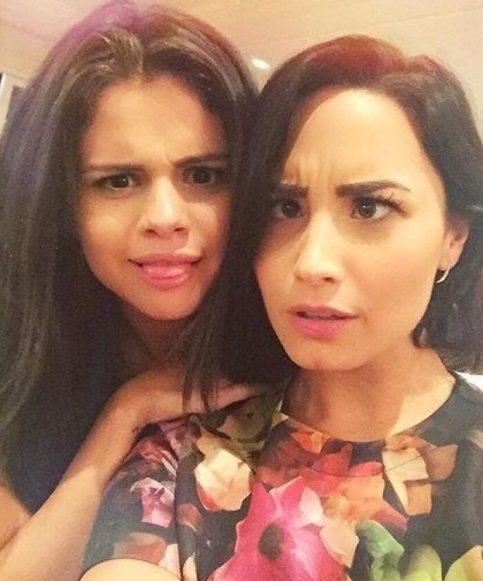 Close-up of two women making funny faces showing celebrity friendships