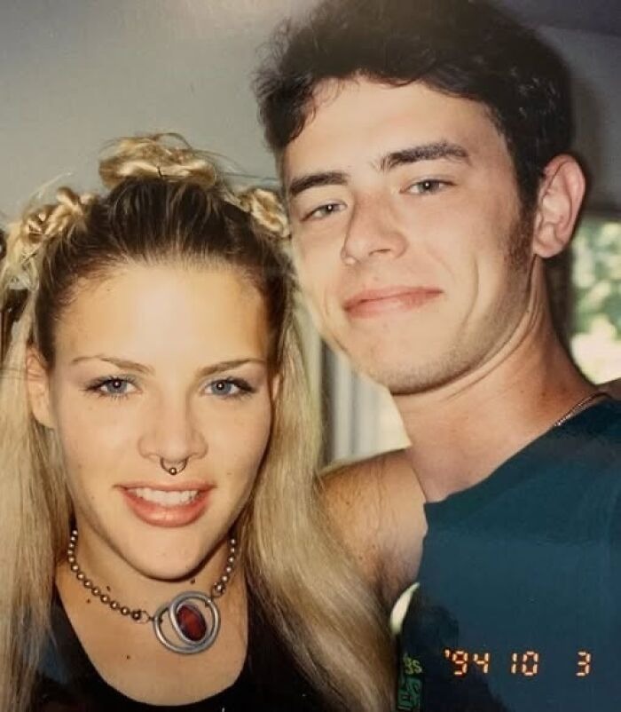 Young man and woman smiling in casual setting symbolizing celebrity friendships