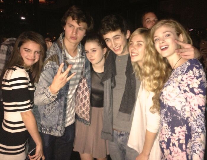 Group of young friends posing at party