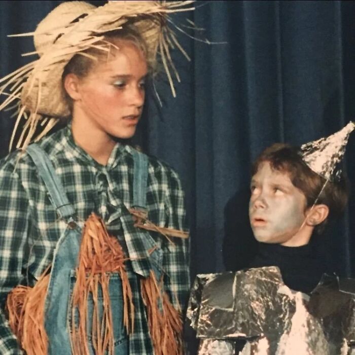 Two children in farm and robot costumes