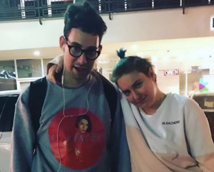 Lena Dunham pictured casually with a friend, representing peak main character syndrome moments in public.