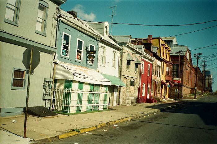 Run-down row of homes and empty street in one of the worst places in the US that people have visited.