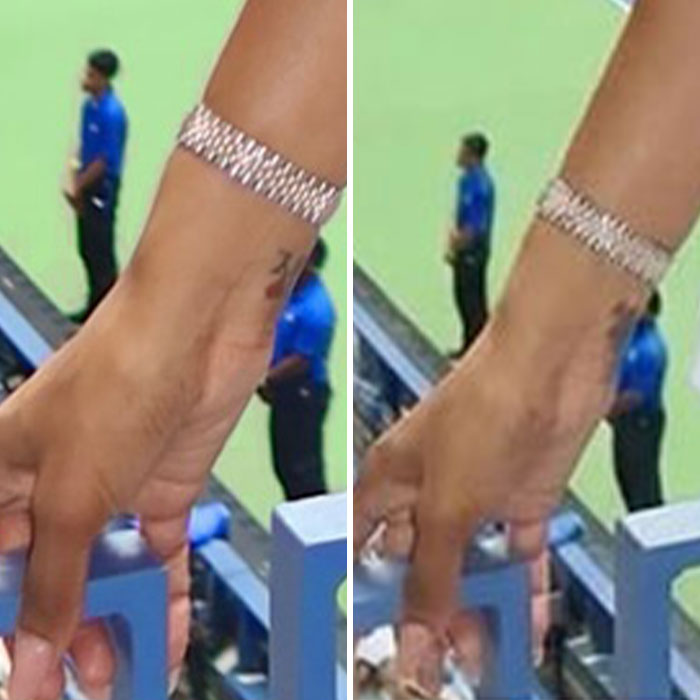 Close-up of a glamorous white influencer's hand wearing a sparkling bracelet after fans notice something is off in the post.