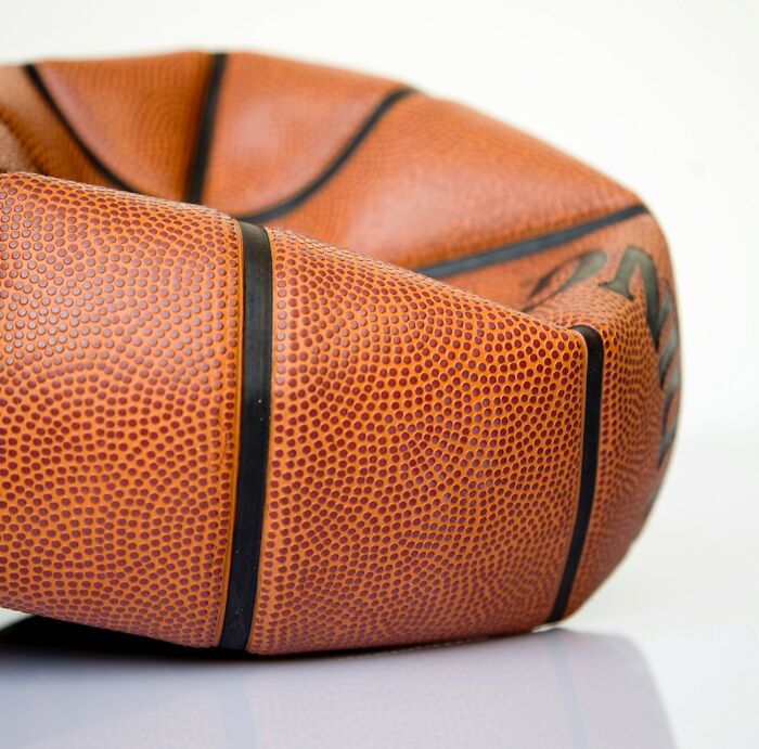 Close-up of a deflated basketball representing unusual items TSA has had to confiscate from travelers.