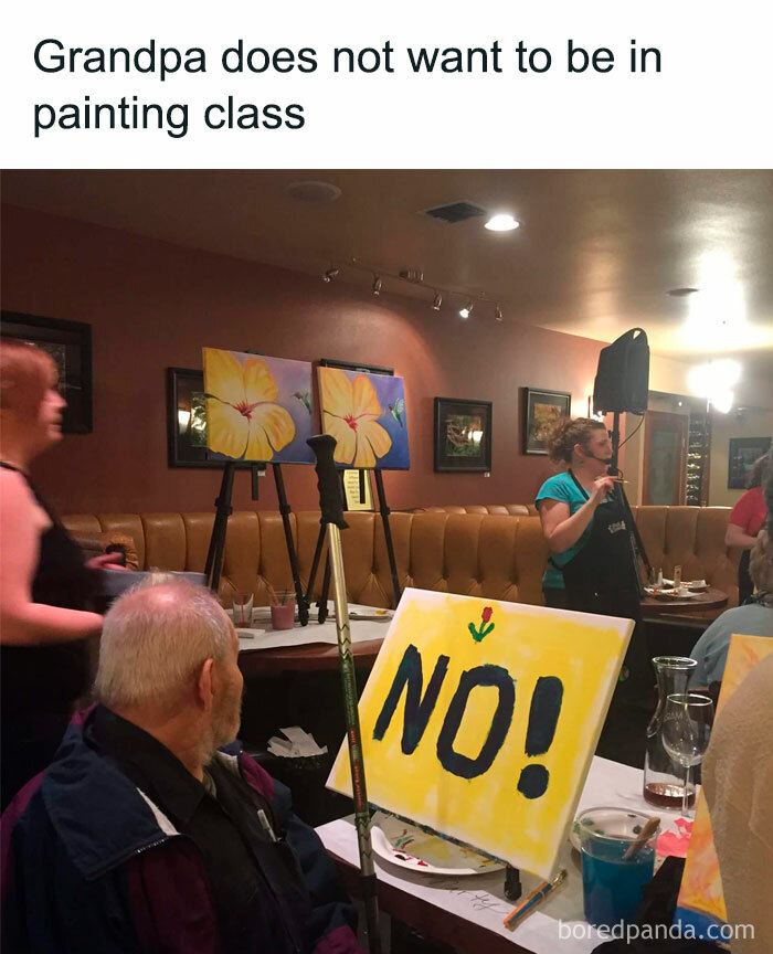 Older man sitting in painting class with a canvas painted NO, funny and lighthearted meme for safe-for-work content.