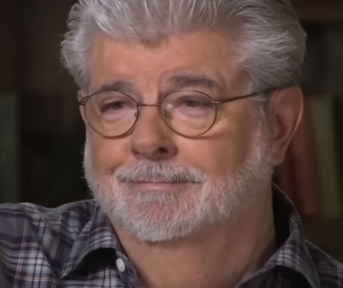 Man with gray hair and glasses reflecting on historical mistakes that were supremely expensive and had massive consequences