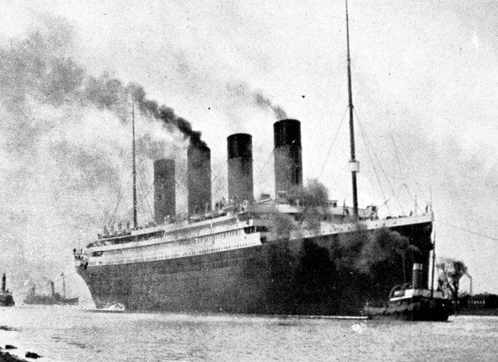 Black and white image of a historic ocean liner with four smokestacks, representing costly historical mistakes and consequences.