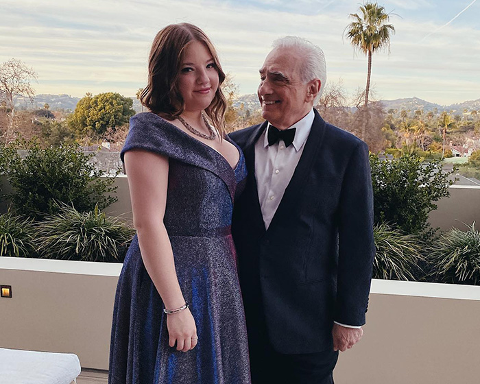 Young woman and older man dressed formally, representing Netflix comedy sparking controversy over nepotism in casting.