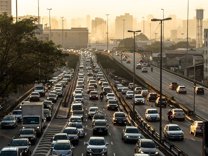 Heavy traffic on busy urban highway during rush hour, illustrating the challenges of commuting after work from home was canceled. Heavy traffic on busy urban highway during rush hour, illustrating the challenges of commuting after work from home was canceled.