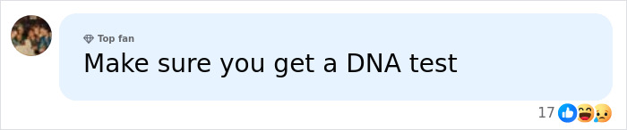 Comment suggesting to get a DNA test, with emoji reactions showing likes, loves, and sad faces on a social media platform.