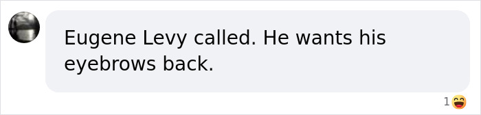 Text message on a phone screen saying Eugene Levy called and wants his eyebrows back, with an emoji reaction.