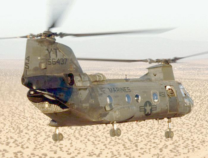 A military helicopter, a CH-46 Sea Knight, flying over a desert. A scary experience.