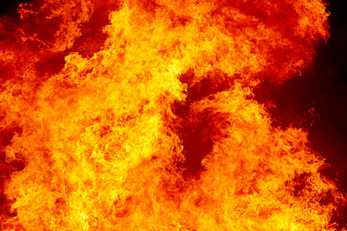 Intense, fiery flames dominate the frame, suggesting a burning event or a very scary experience.