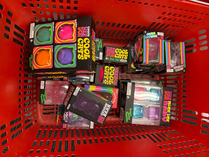 Shopping basket filled with various bulk items amid a scalper incident in store involving police intervention. Shopping basket filled with various bulk items amid a scalper incident in store involving police intervention.