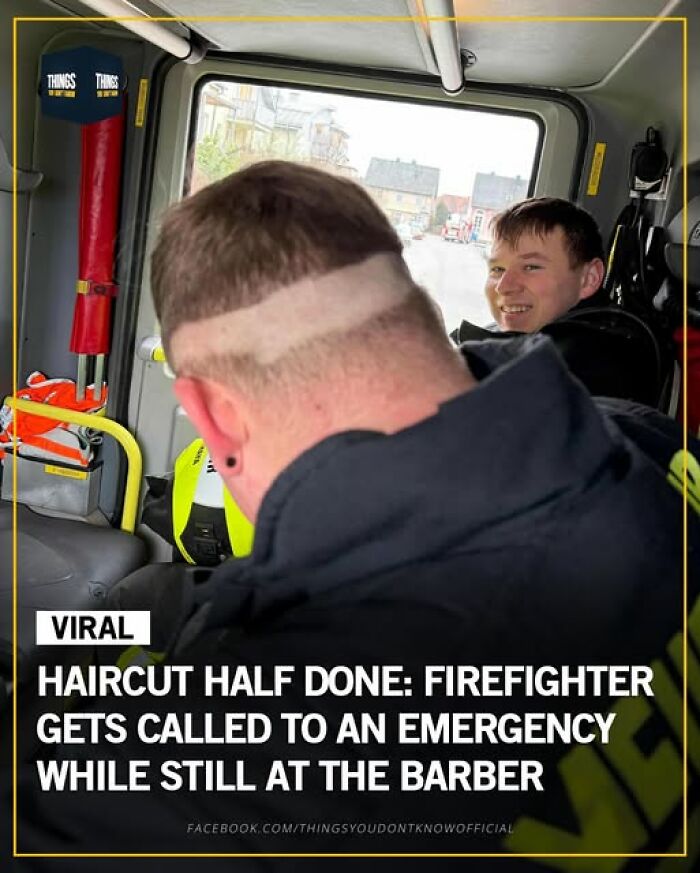 Firefighter with half-finished haircut smiling inside emergency vehicle, showing great, weird, and unusual moments in the world.