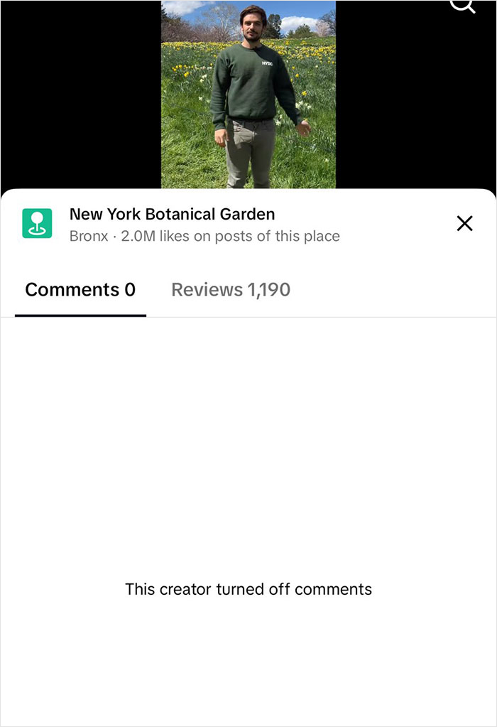 Handsome New York Botanical Garden scientist standing in a field with comments turned off on social media post. Handsome New York Botanical Garden scientist standing in a field with comments turned off on social media post.