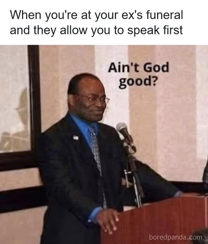 A man smirking at a podium, with the text "Ain't God good?" This unhinged meme will make your inner goblin laugh.
