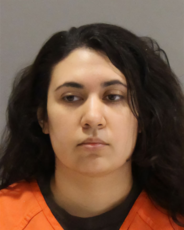 Mugshot of woman involved in fatal police takedown after attacking toddler with knife at Walmart.