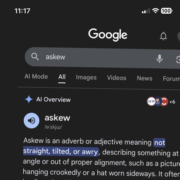 Google Easter Eggs search result for the word askew with tilted text and definition on a mobile screen.