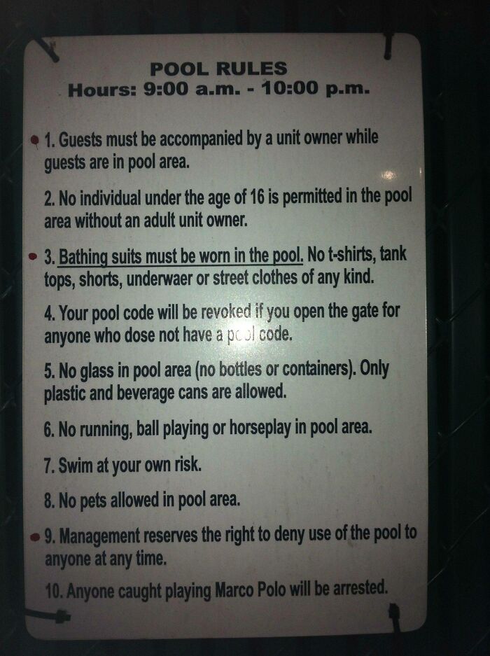 Pool rules sign with rule #3 stating no underwear in the pool, an oddly specific rule.