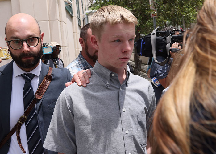 Stepbrother in Anna Kepner cruise ship tragedy escorted by lawyer outside court