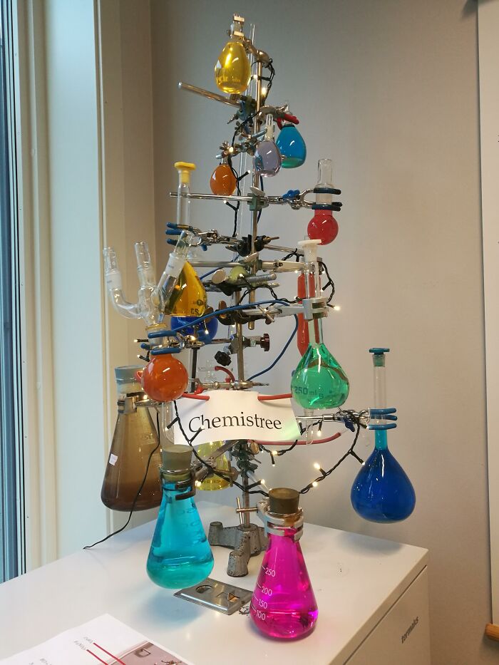 Chemistry lab equipment arranged as a colorful festive chemistry tree