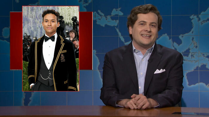 A man in a suit jacket on an SNL set, smiling next to a red inset image of a man in a tuxedo. Met Gala 2026. A man in a suit jacket on an SNL set, smiling next to a red inset image of a man in a tuxedo. Met Gala 2026.