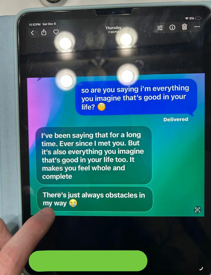 A tablet displaying text messages, illustrating a story about catching a BF cheating. A finger is touching the screen.