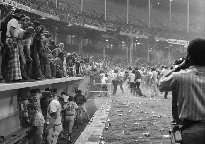 Black and white photo of baseball crowd chaos as PR fail example