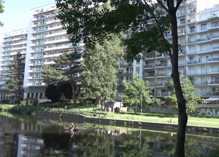 Canal and apartment buildings near location of boy found with towel in France