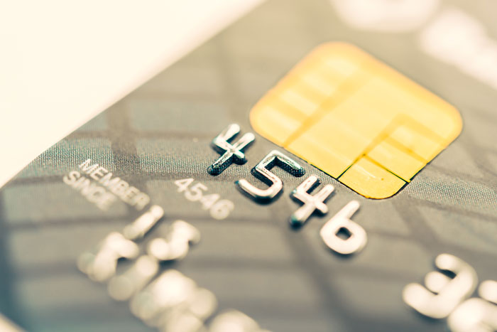 Macro shot of credit card chip highlighting glitch in the matrix technology