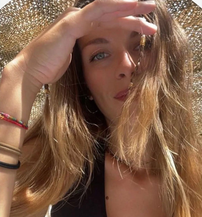 Close-up selfie of woman with sunhat on Maldives diving trip