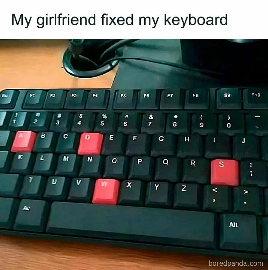 Keyboard with letters ASDW highlighted as funny keyboard fix by girlfriend