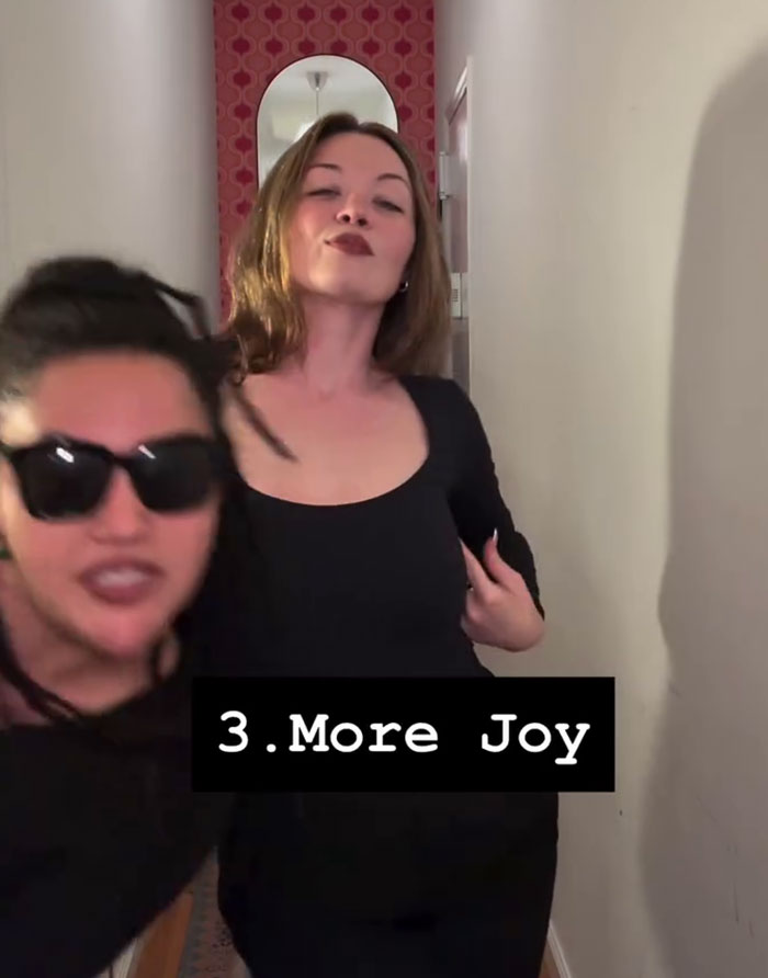 Two moms in hallway with text More Joy about forming a mommune Two moms in hallway with text More Joy about forming a mommune