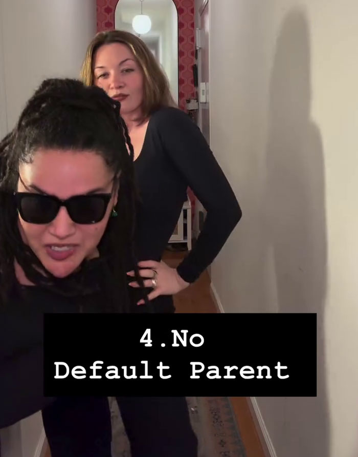 Two moms in hallway with text No Default Parent forming a mommune Two moms in hallway with text No Default Parent forming a mommune