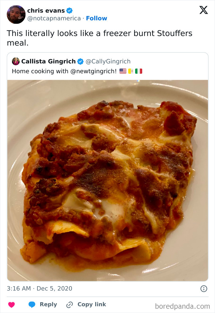 Burnt lasagna slice on a white plate with melted cheese and sauce