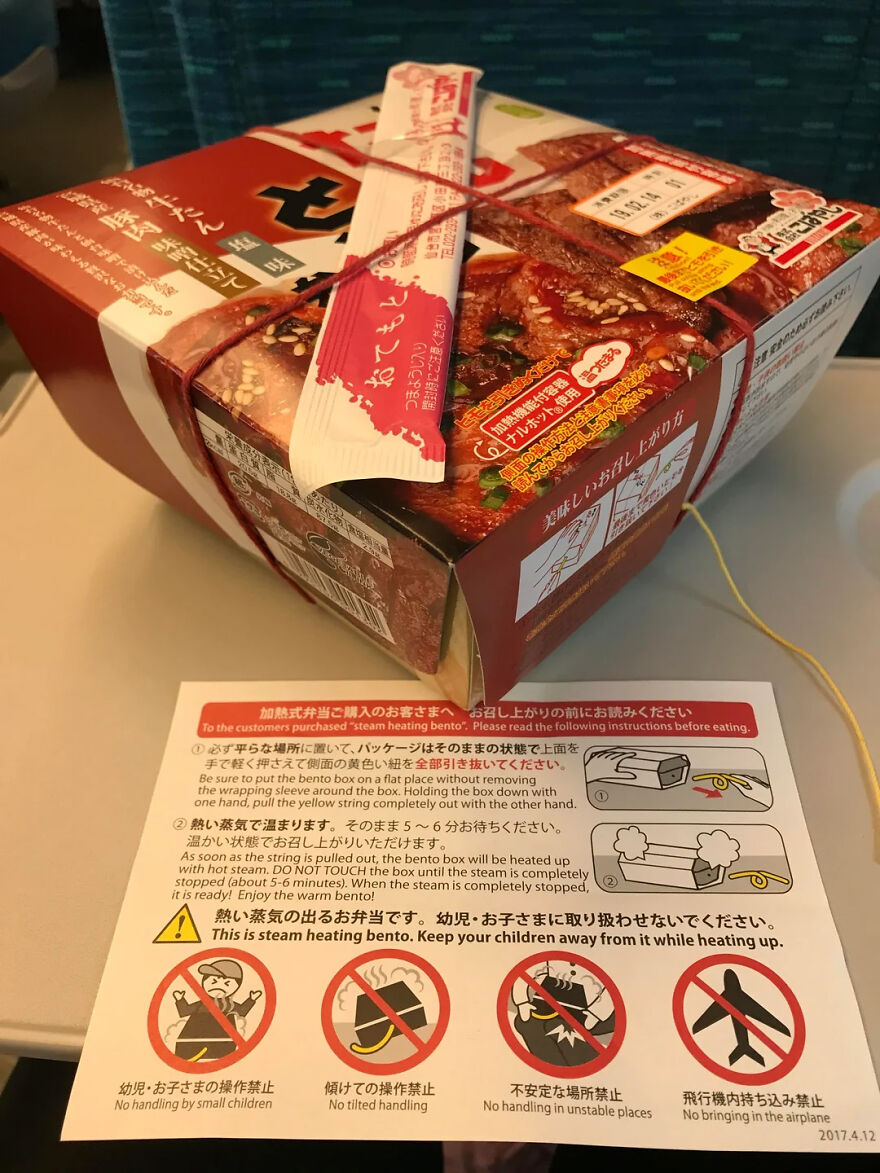 A Japanese steam-heating bento box with instructions on safe use, a unique Japanese thing.