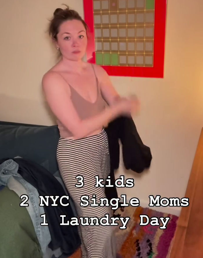 Single mom doing laundry representing 2 NYC single moms with 3 kids Single mom doing laundry representing 2 NYC single moms with 3 kids
