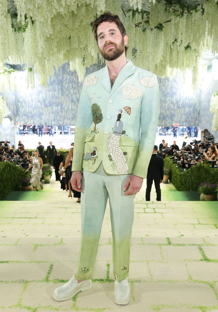 A man in an eccentric pastel green suit with landscape embroidery, a contender for worst dressed stars at Met Gala.