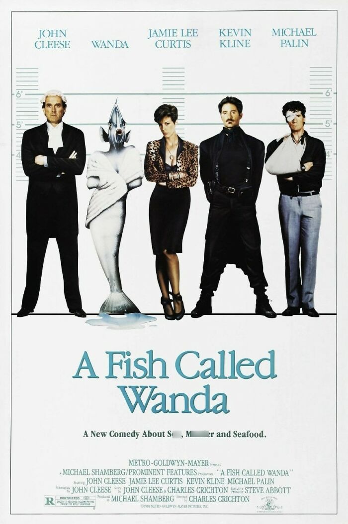 A Fish Called Wanda comedy movie poster with cast in a lineup and a fish character