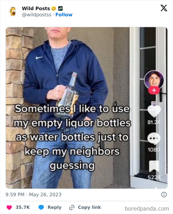 Man holding empty liquor bottle used to confuse neighbors