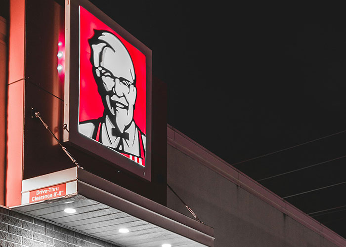 KFC restaurant sign glowing at night minor inconvenience emergency