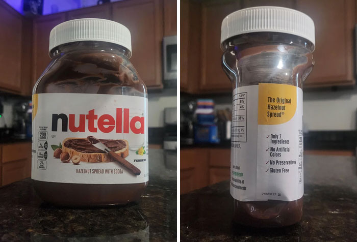 Half full jar of Nutella hazelnut spread showing minimal product inside