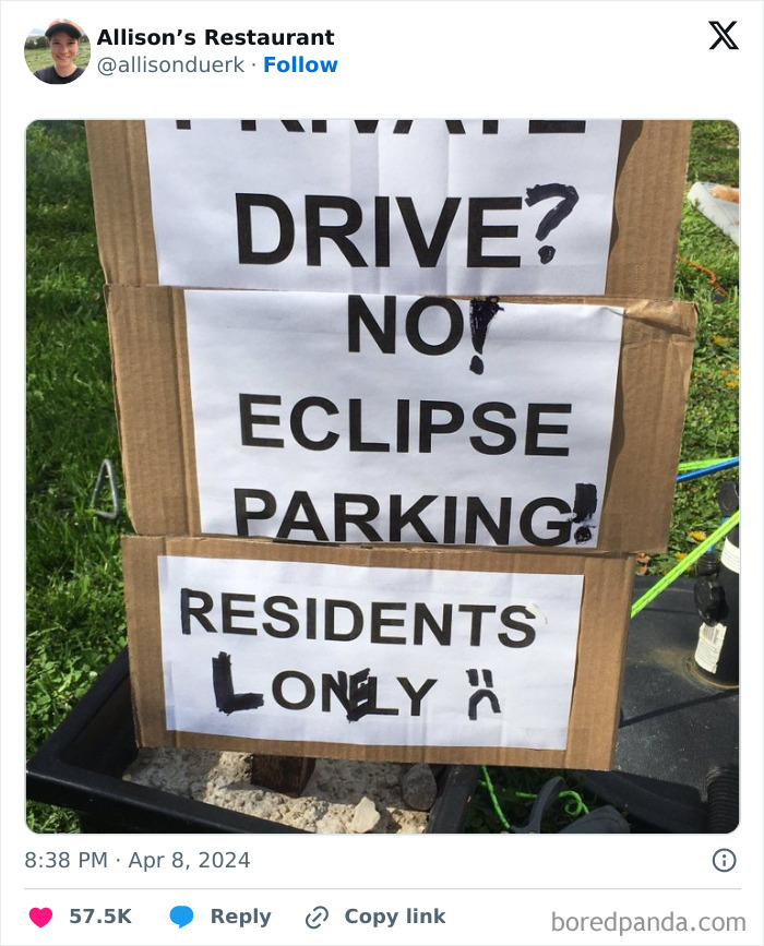 Funny neighborhood sign about eclipse parking for residents only
